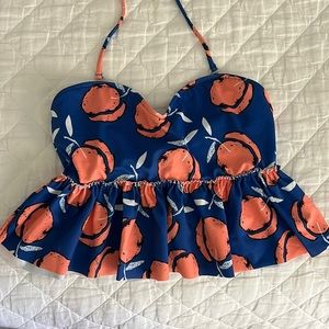 Kortni Jeane peaches flutter halter swim top.